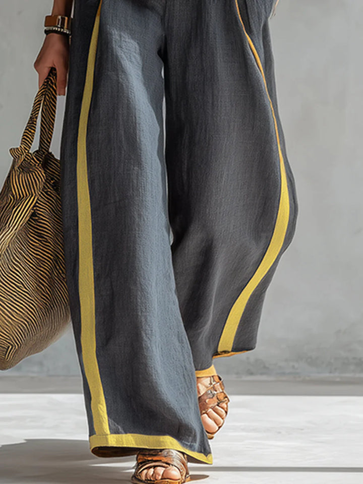 Leila -  Set elegante e casual composto da gilet e pantaloni con bordini bicolori.